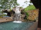 Waterfall into swimming pool